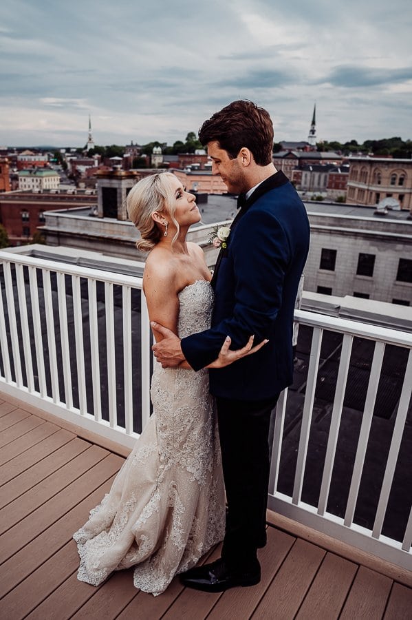 Bride and groom on rooftop