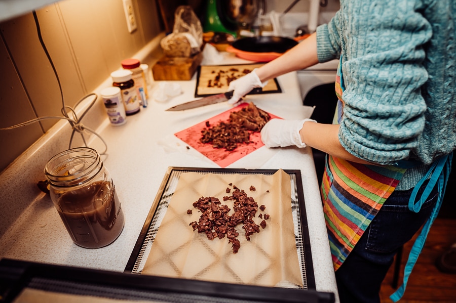 Putting chunks of placenta on tray