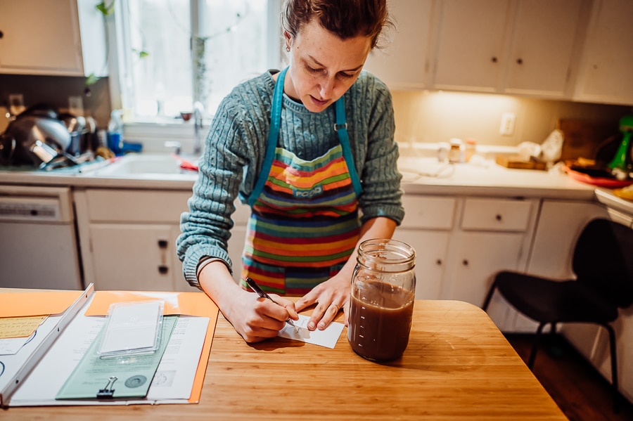 Woman writing on paper