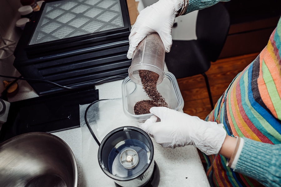 Pouring blended placenta into bowl