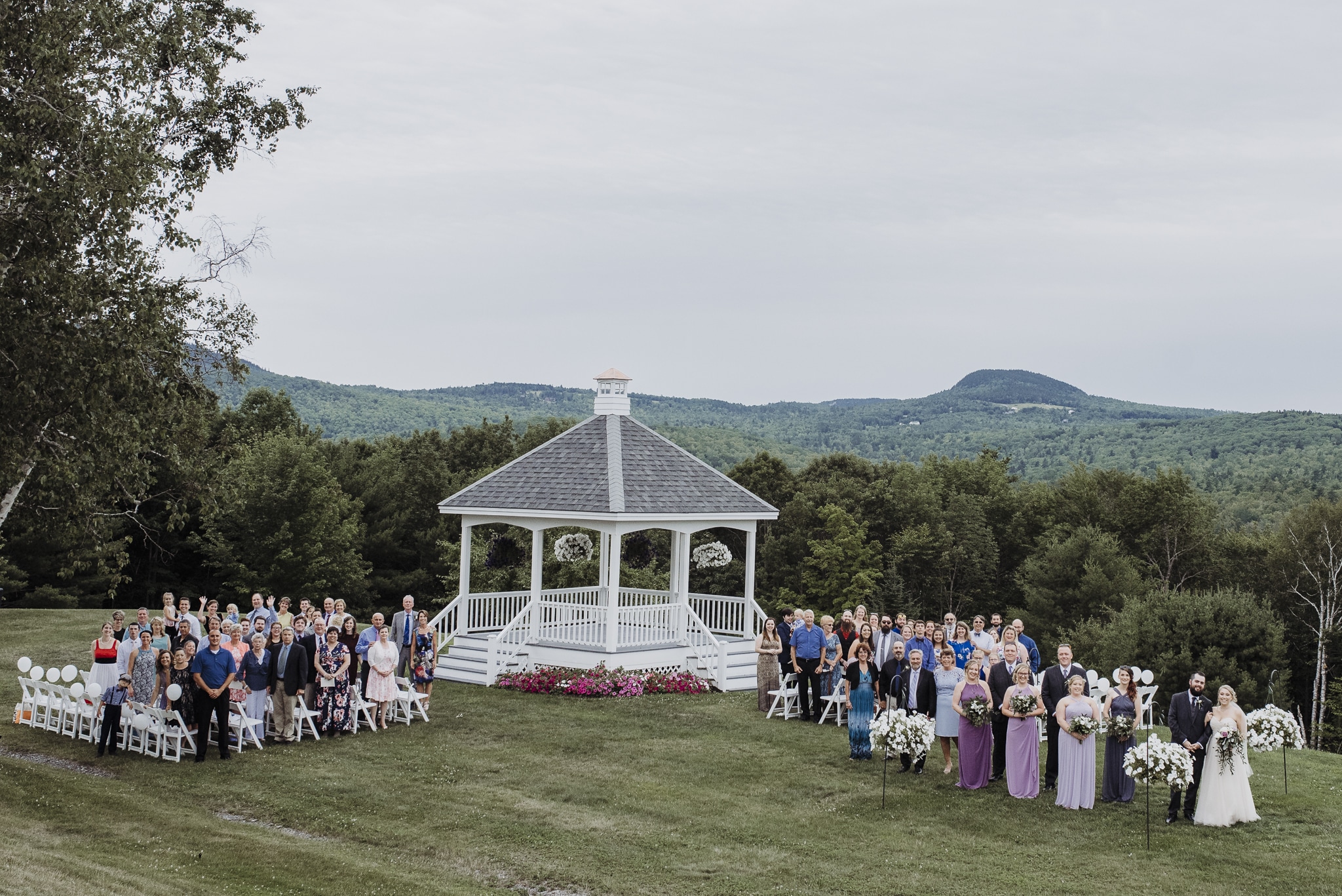 Wedding and all guests at lucerne inn next to gazebo