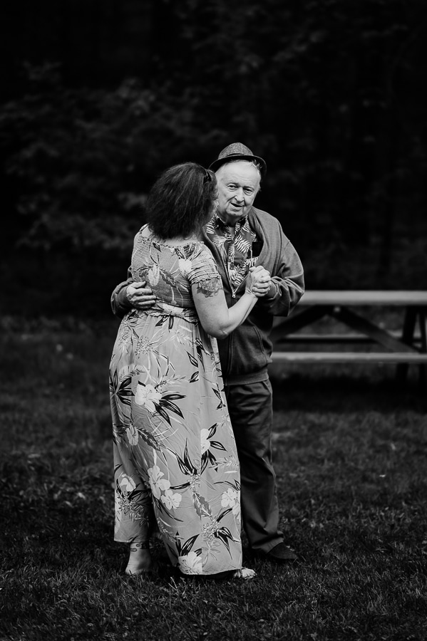 Black and white image of daughter and father dancing