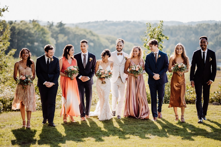 Bridal party in different dresses walking together