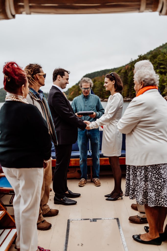 Bide and groom exchanging vows on Jericho Boat